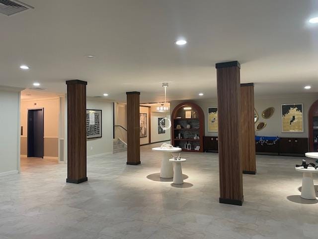 360 Central Ave Unit 218-219, Lawrence, NY 11559 - unfurnished living room with recessed lighting, arched walkways, and elevator