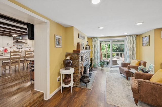 123 Pleasant Rd, Lake Peekskill, NY 10537 - living area with hardwood / wood-style flooring, a fireplace with raised hearth, and recessed lighting