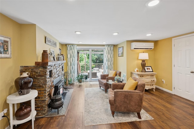 123 Pleasant Rd, Lake Peekskill, NY 10537 - living area featuring an AC wall unit and wood finished floors