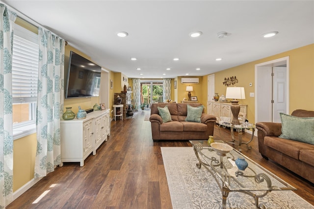 123 Pleasant Rd, Lake Peekskill, NY 10537 - living room featuring dark wood-type flooring, recessed lighting, and an AC wall unit