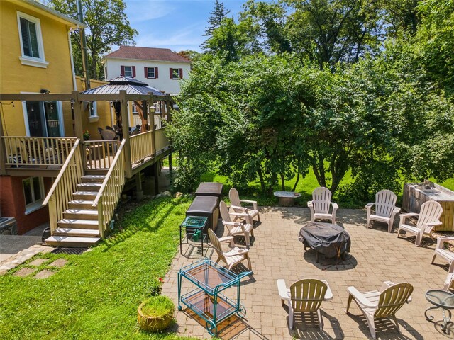 123 Pleasant Rd, Lake Peekskill, NY 10537 - view of yard featuring an outdoor fire pit, stairs, a gazebo, a patio, and a wooden deck