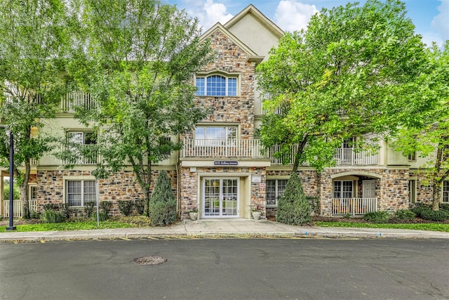 24 N De Baun Ave Unit 304, Suffern, NY 10901 - view of front of home featuring stucco siding and stone siding