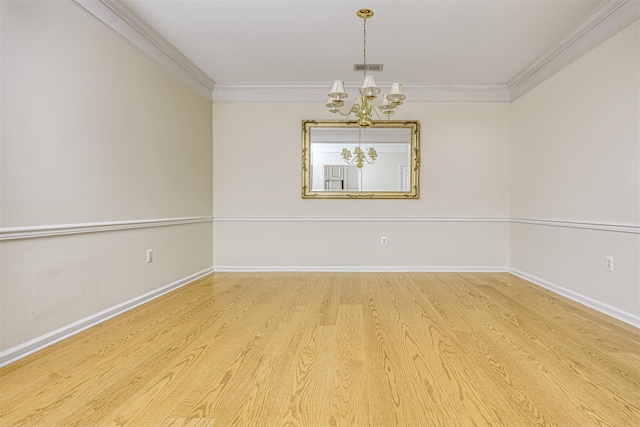 24 N De Baun Ave Unit 304, Suffern, NY 10901 - unfurnished room featuring a chandelier, ornamental molding, and wood finished floors