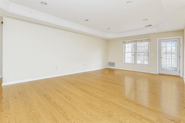 24 N De Baun Ave Unit 304, Suffern, NY 10901 - empty room featuring a raised ceiling, light wood-style flooring, ornamental molding, and recessed lighting