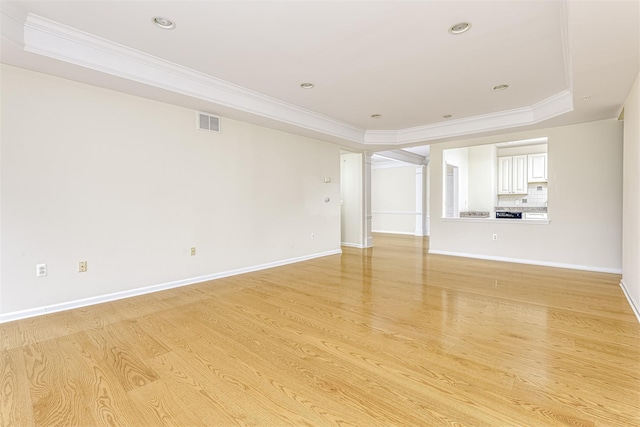 24 N De Baun Ave Unit 304, Suffern, NY 10901 - unfurnished room featuring a tray ceiling, crown molding, light wood finished floors, and recessed lighting