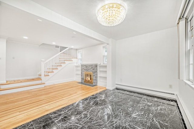 37 Keystone Pl, Hewlett, NY 11557 - unfurnished living room with marble tiled flooring, stairway, a chandelier, baseboard heating, and recessed lighting