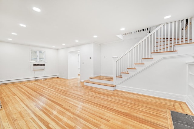 37 Keystone Pl, Hewlett, NY 11557 - unfurnished living room featuring baseboard heating, stairway, wood finished floors, and recessed lighting