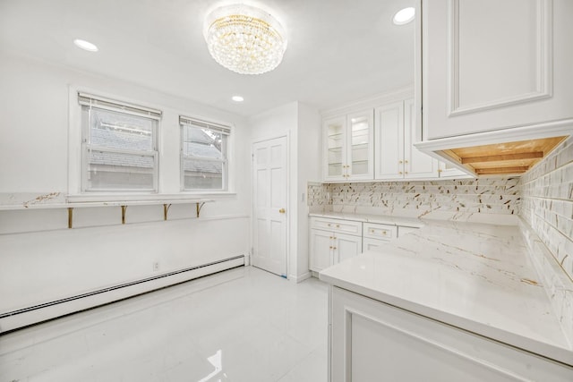 37 Keystone Pl, Hewlett, NY 11557 - kitchen featuring a baseboard radiator, a chandelier, white cabinetry, backsplash, and recessed lighting
