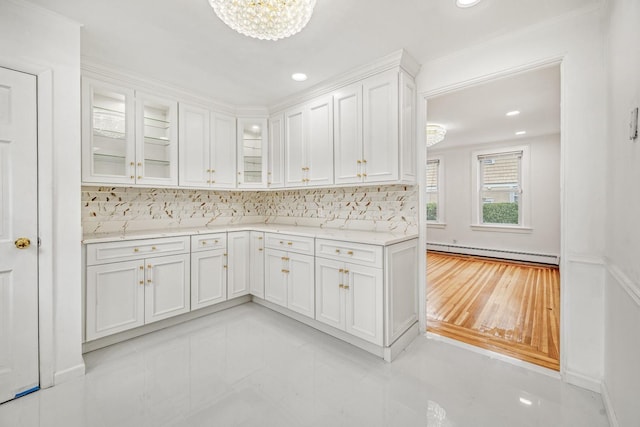 37 Keystone Pl, Hewlett, NY 11557 - kitchen featuring a baseboard radiator, backsplash, white cabinetry, glass insert cabinets, and recessed lighting