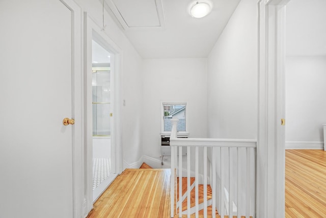 37 Keystone Pl, Hewlett, NY 11557 - hall with an upstairs landing, wood finished floors, and attic access