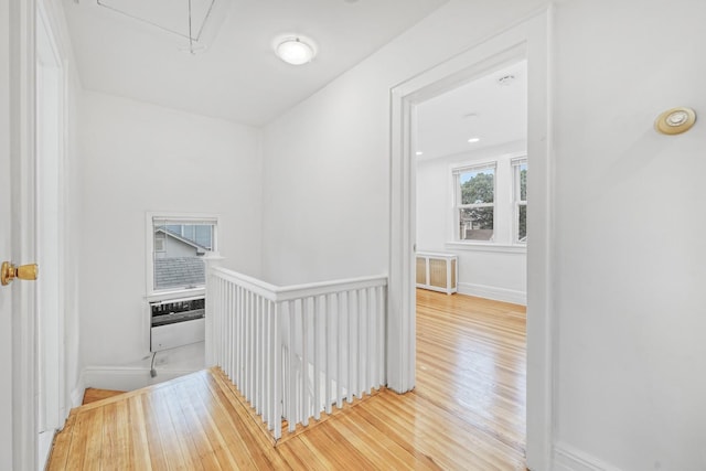 37 Keystone Pl, Hewlett, NY 11557 - hallway featuring an upstairs landing, attic access, wood finished floors, and cooling unit