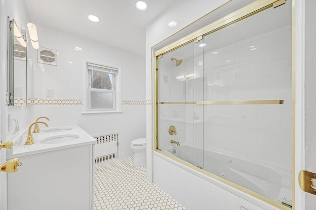 37 Keystone Pl, Hewlett, NY 11557 - full bath featuring radiator heating unit, combined bath / shower with glass door, double vanity, and recessed lighting