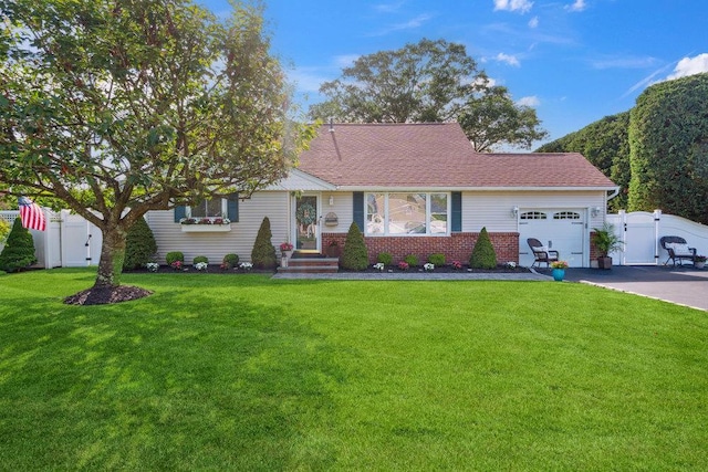 531 Myrtle Ave, West Islip, NY 11795 - view of front facade featuring an attached garage, a gate, asphalt driveway, and a shingled roof