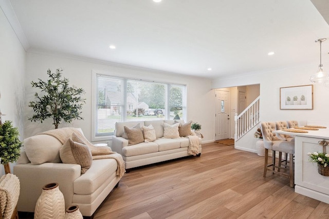 531 Myrtle Ave, West Islip, NY 11795 - living area with crown molding, stairway, light wood finished floors, and recessed lighting