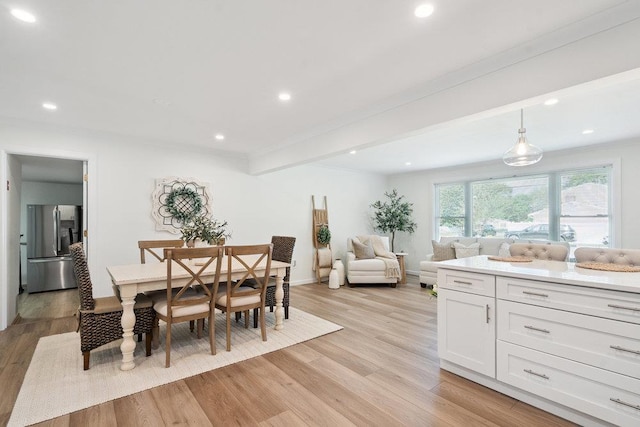 531 Myrtle Ave, West Islip, NY 11795 - dining space with light wood-type flooring, recessed lighting, beamed ceiling, and crown molding