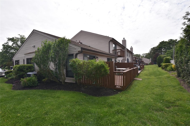 19 Stanford Ct Unit 19, Wantagh, NY 11793 - view of property exterior with a lawn