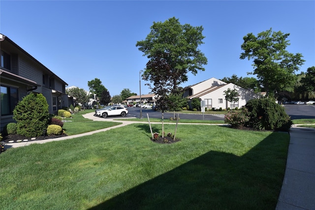 19 Stanford Ct Unit 19, Wantagh, NY 11793 - view of grassy yard featuring a residential view