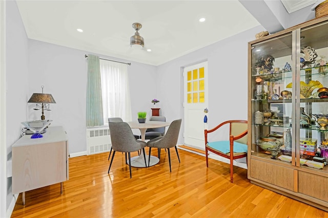 22424 Union Tpke Unit 3C, Oakland Gardens, NY 11364 - dining area with radiator heating unit, light wood-type flooring, and recessed lighting