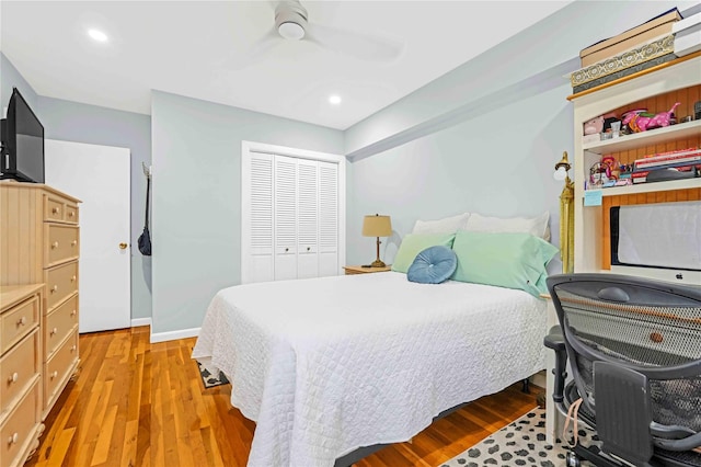 22424 Union Tpke Unit 3C, Oakland Gardens, NY 11364 - bedroom with light wood-style floors, a closet, a ceiling fan, and recessed lighting
