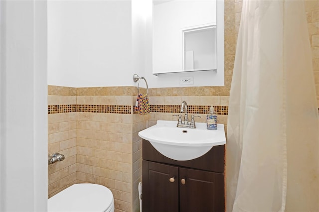 22424 Union Tpke Unit 3C, Oakland Gardens, NY 11364 - bathroom featuring tile walls and vanity