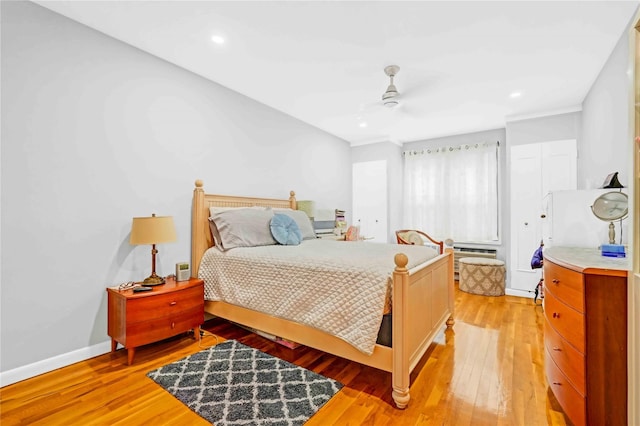 22424 Union Tpke Unit 3C, Oakland Gardens, NY 11364 - bedroom with light wood-style floors, a ceiling fan, and recessed lighting
