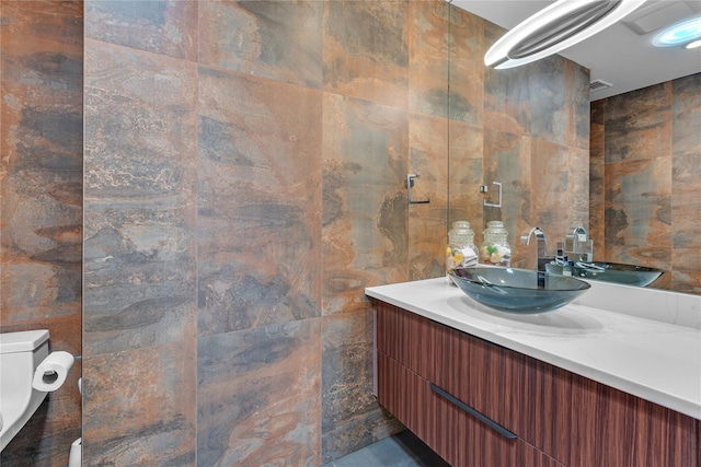 9 Captains Walk E, Bay Shore, NY 11706 - bathroom with vanity and tile walls