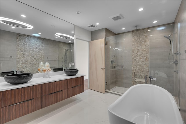 9 Captains Walk E, Bay Shore, NY 11706 - full bath with a shower stall, double vanity, a freestanding bath, and recessed lighting