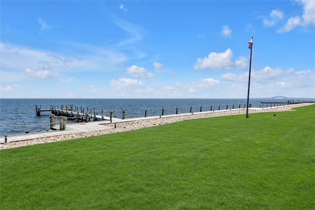 9 Captains Walk E, Bay Shore, NY 11706 - dock featuring a lawn and a water view