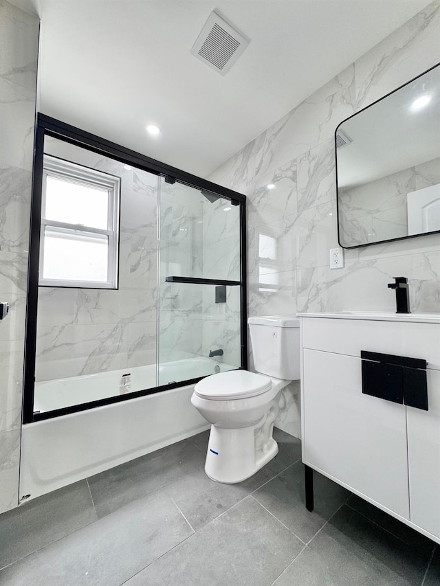 114-62 203rd St, Saint Albans, NY 11412 - bathroom with vanity and bath / shower combo with glass door