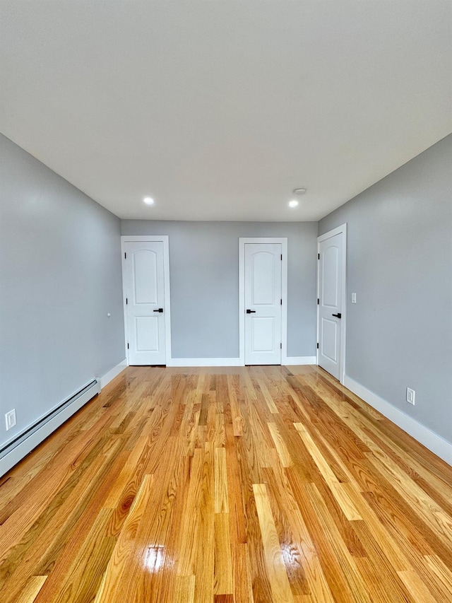 114-62 203rd St, Saint Albans, NY 11412 - unfurnished room featuring recessed lighting, light wood finished floors, and baseboard heating