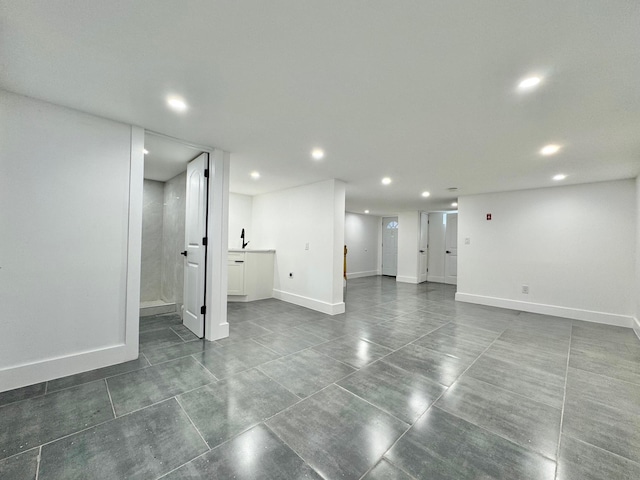 114-62 203rd St, Saint Albans, NY 11412 - finished below grade area with recessed lighting and dark tile patterned flooring