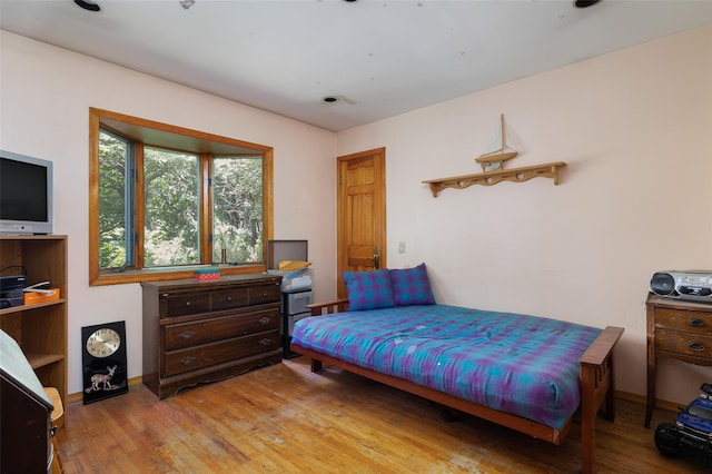 33 N Coleman Rd, Centereach, NY 11720 - bedroom with light wood-style floors