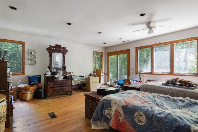 33 N Coleman Rd, Centereach, NY 11720 - bedroom with light wood-style floors and recessed lighting