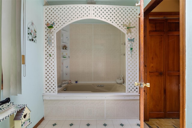 33 N Coleman Rd, Centereach, NY 11720 - full bathroom featuring a relaxing tiled tub and tile patterned flooring