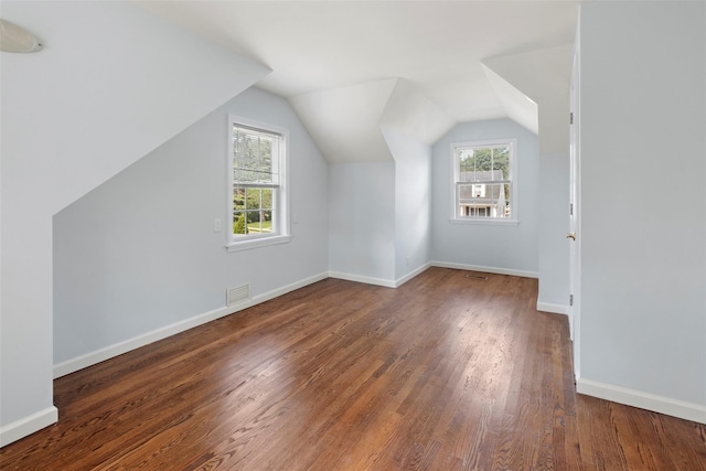 15 Le Britton St, Locust Valley, NY 11560 - additional living space featuring wood finished floors and lofted ceiling