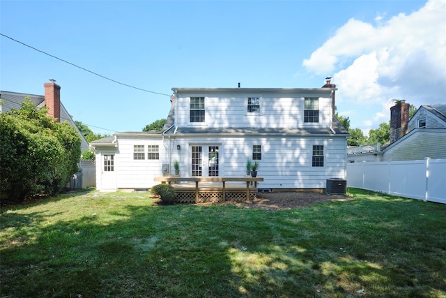 15 Le Britton St, Locust Valley, NY 11560 - rear view of property with a wooden deck, a fenced backyard, french doors, and a chimney