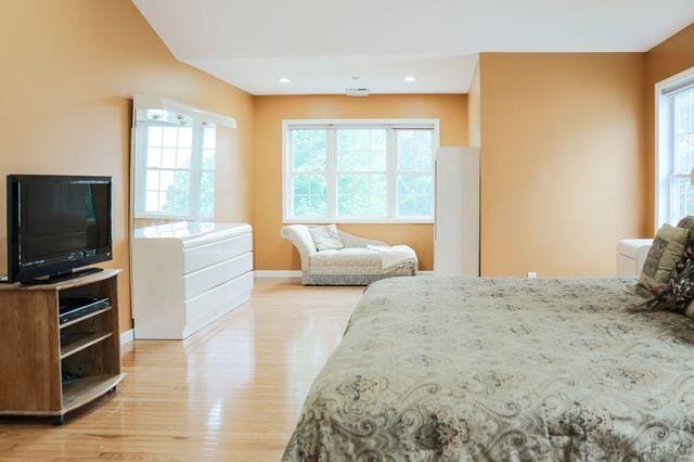 97 Reunion Rd, White Plains, NY 10603 - bedroom with light wood finished floors and recessed lighting