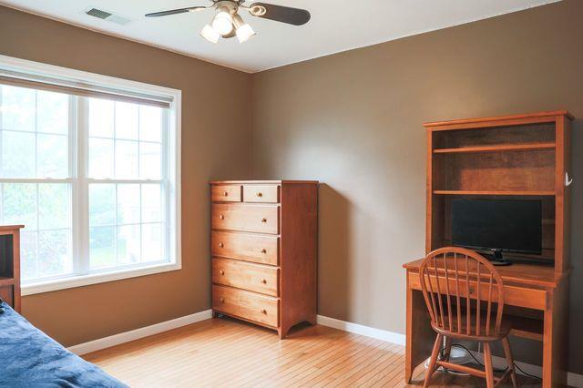 97 Reunion Rd, White Plains, NY 10603 - home office featuring healthy amount of natural light, light wood-type flooring, and ceiling fan