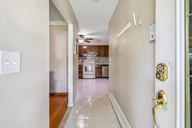 30 Lincoln Ave, Port Jefferson Station, NY 11776 - hall featuring light tile patterned flooring and baseboards
