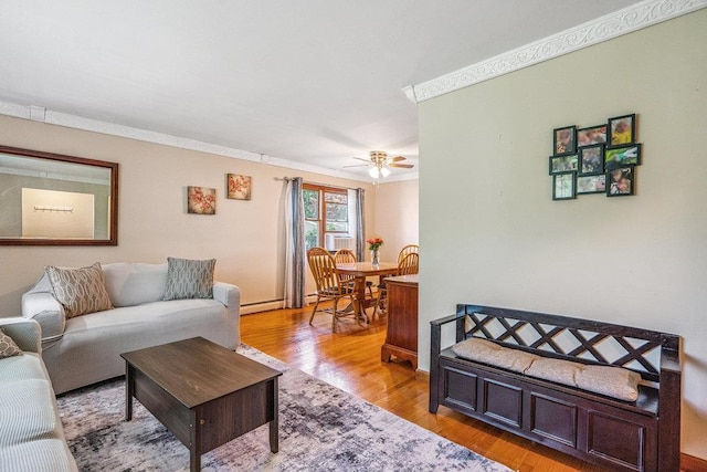 30 Lincoln Ave, Port Jefferson Station, NY 11776 - living area with light wood-style floors, a ceiling fan, and crown molding
