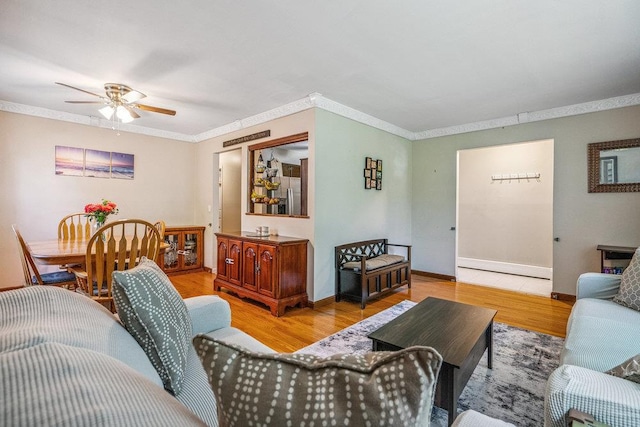 30 Lincoln Ave, Port Jefferson Station, NY 11776 - living room with ornamental molding, a ceiling fan, and wood finished floors