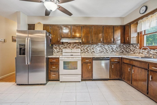 30 Lincoln Ave, Port Jefferson Station, NY 11776 - kitchen featuring stainless steel appliances, under cabinet range hood, light countertops, a ceiling fan, and backsplash