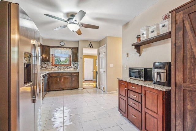 30 Lincoln Ave, Port Jefferson Station, NY 11776 - kitchen with stainless steel appliances, ceiling fan, open shelves, tasteful backsplash, and light tile patterned floors