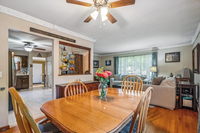 30 Lincoln Ave, Port Jefferson Station, NY 11776 - dining room featuring a ceiling fan and crown molding