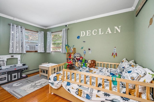 30 Lincoln Ave, Port Jefferson Station, NY 11776 - bedroom with crown molding, wood finished floors, and cooling unit