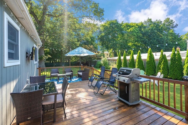 30 Lincoln Ave, Port Jefferson Station, NY 11776 - wooden terrace with a grill and a fenced backyard