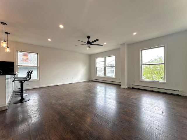 37 E Fulton St, Lido Beach, NY 11561 - unfurnished living room featuring a baseboard heating unit, a baseboard radiator, dark wood-style flooring, a ceiling fan, and recessed lighting