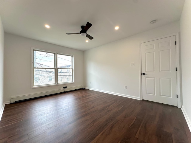 37 E Fulton St, Lido Beach, NY 11561 - empty room featuring a baseboard heating unit, dark wood-type flooring, ceiling fan, a smoke detector, and recessed lighting