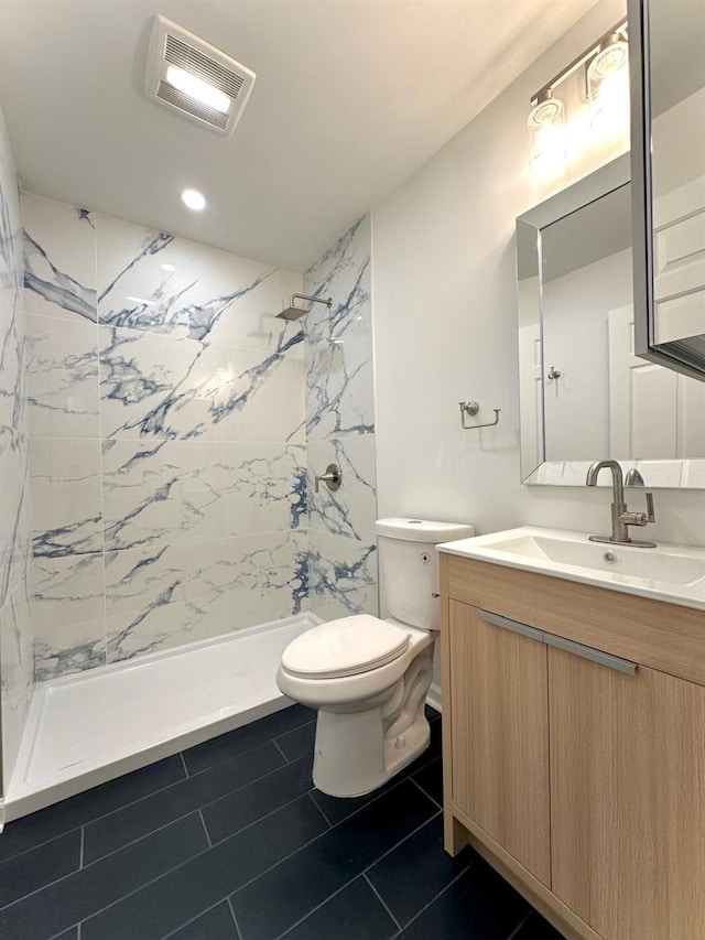 37 E Fulton St, Lido Beach, NY 11561 - bathroom featuring vanity, a marble finish shower, tile patterned flooring, and recessed lighting