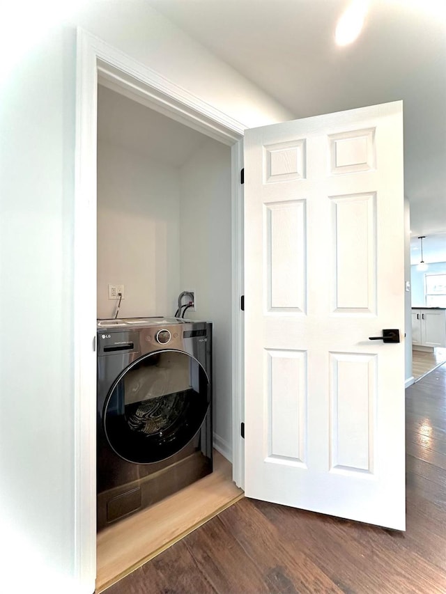 37 E Fulton St, Lido Beach, NY 11561 - laundry area featuring washer / clothes dryer and wood finished floors